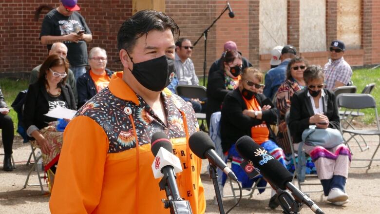 Bobby Cameron speaking at a press conference