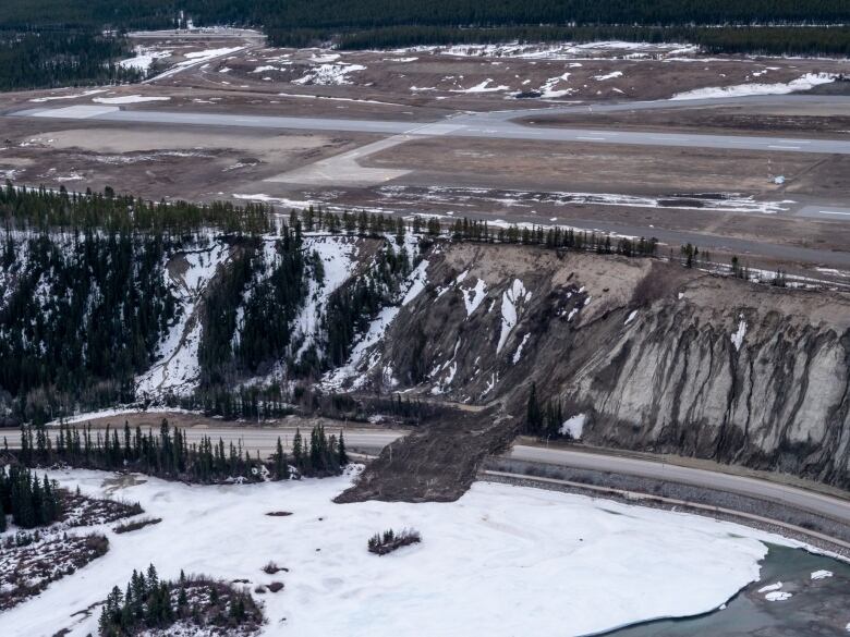 An aerial view of a landslide area along an escarpment.