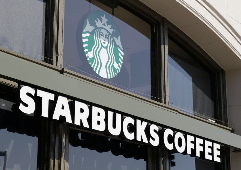 A Starbucks storefront is pictured, showing the logo and 'Starbucks' name.