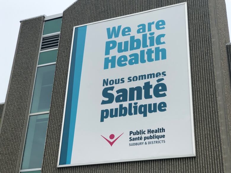 A sign that says ' We are public health.'