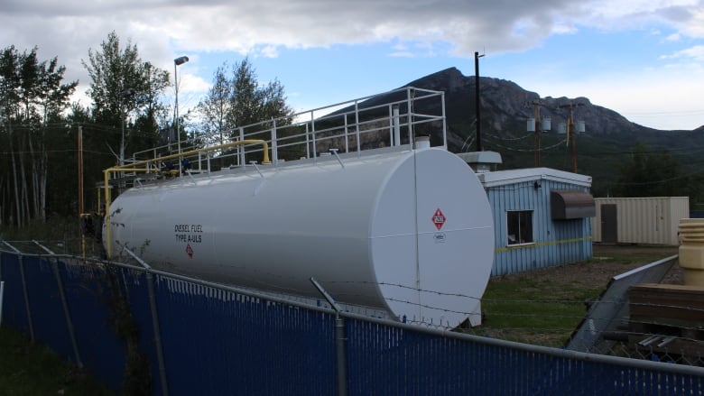 A white gas container.