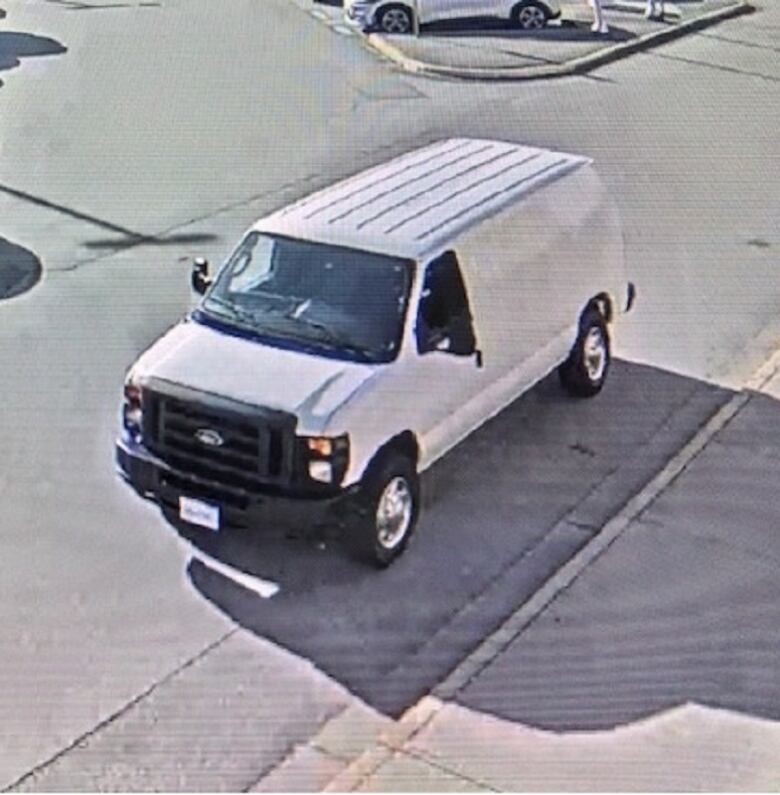 A white Ford van.