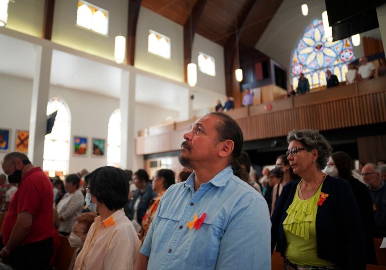 People standing in a church.