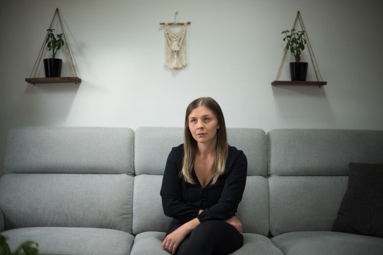 Former personal support worker Lindsay Couture poses for a photograph at her home in Courtice, Ont., on Tuesday, July 26, 2022. 