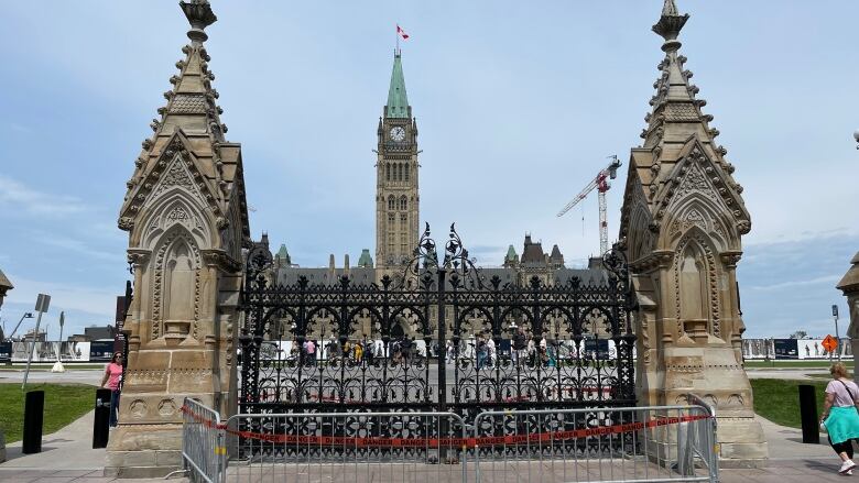 The front gates of Parliament Hill, cordoned off with red tape and barricades.