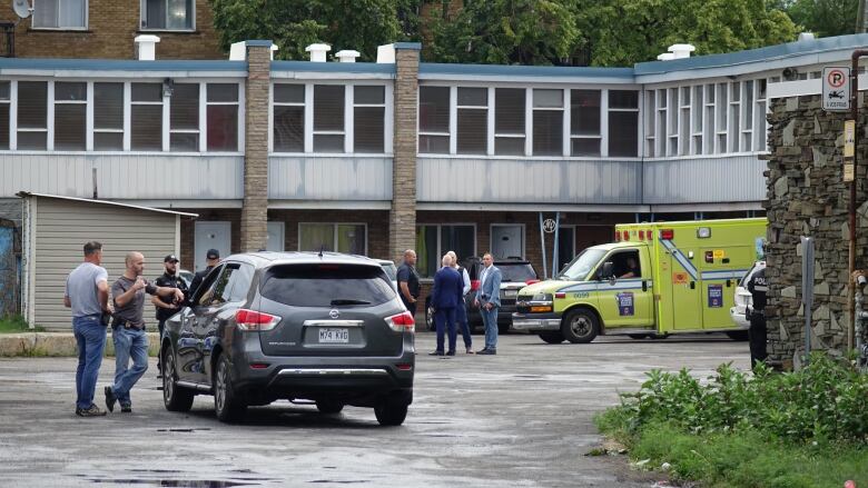 An ambulance outside a motel.