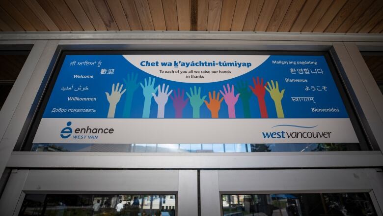 A West Vancouver welcome sign has the term 'welcome' in multiple languages  German, English, Punjabi, Hindi, Chinese, and Russian among them. 