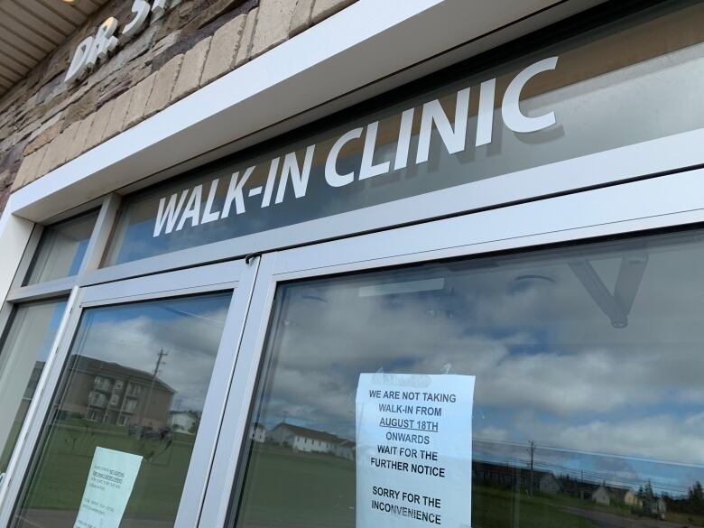 Exterior sign, says walk-in clinic