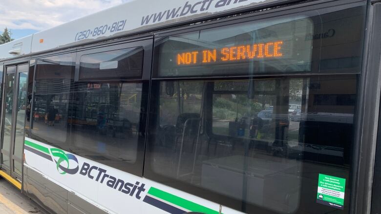 A B.C. Transit bus with the words 'not in service' on the side.