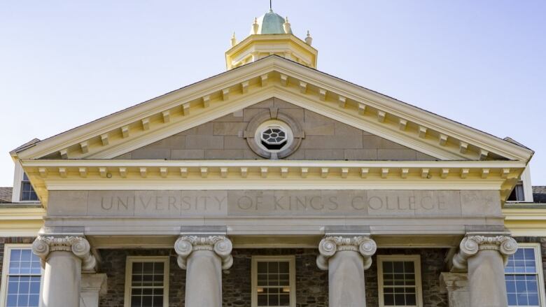 Pillars support a building with the words University of King's College.