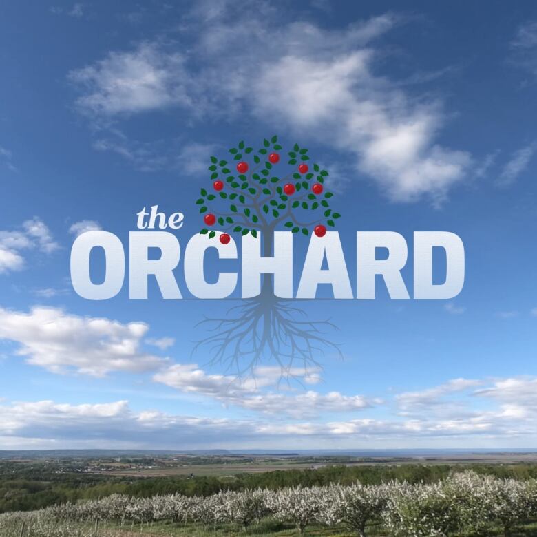 A stylized tree with apples in the words The Orchard with a view of a lush valley with blue sky.