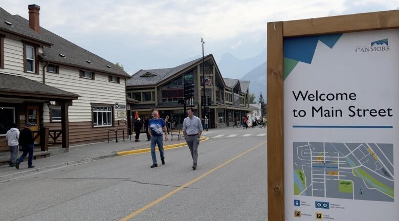 A shot of Main Street in Canmore, with a sign that says 