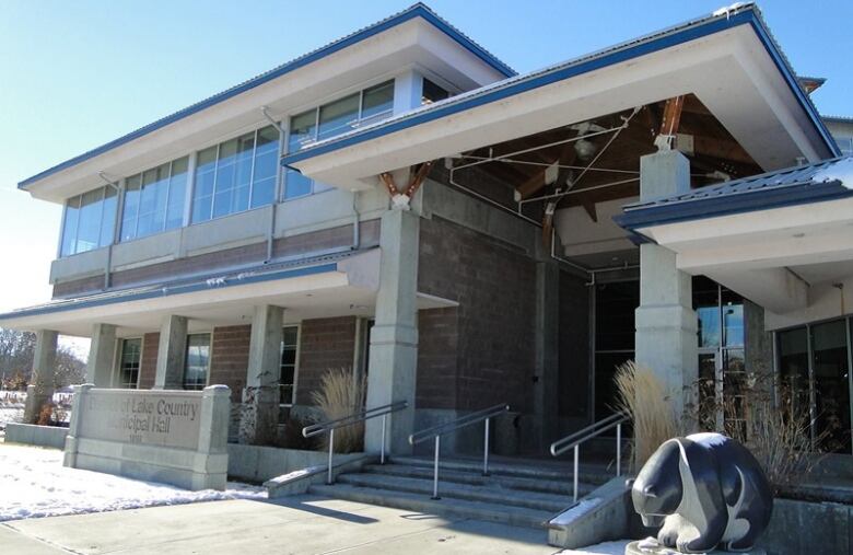 A large building with the text 'District of Lake Country Municipal Hall' visible off to the side.