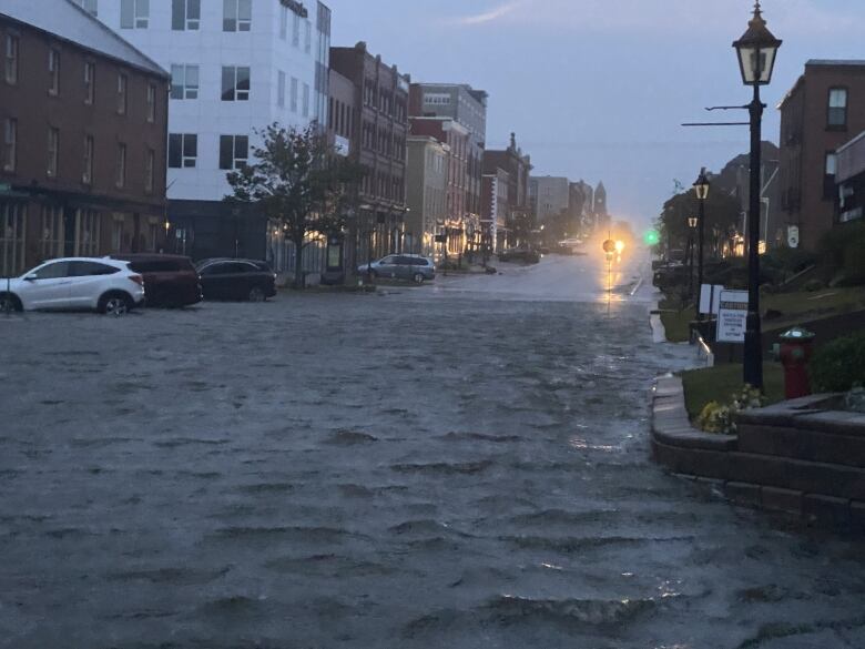 Water on a road in downtown Charlottetown 