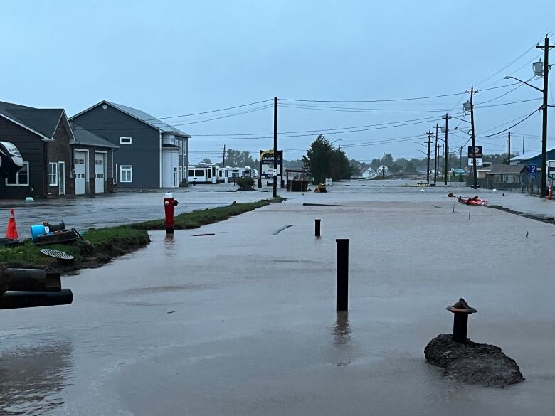 Flooding on a street in Shediac, New Brunswick. 