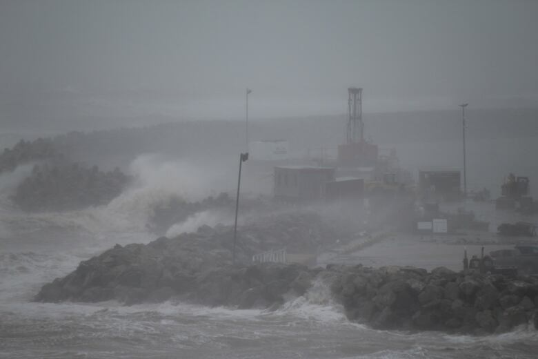 Large waves batter a wharf in the Magdalen Islands as the post-tropical storm Fiona passes through.