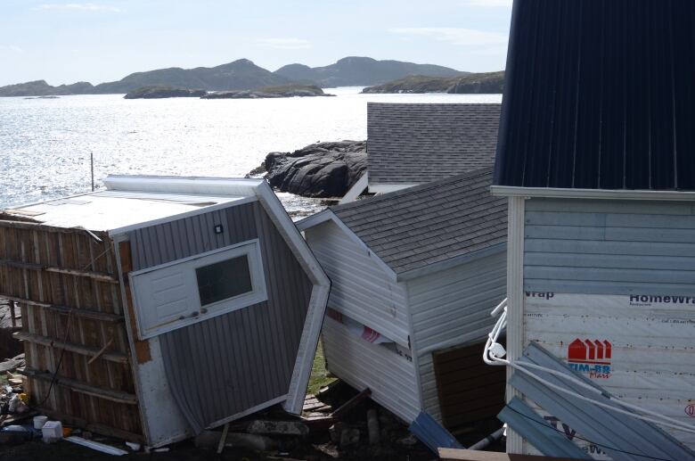 Houses and sheds destroyed by a major tropical storm.