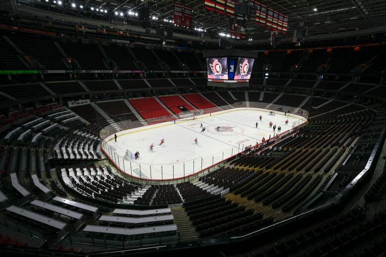 A wide shot of the Ottawa Senators stands and rink.