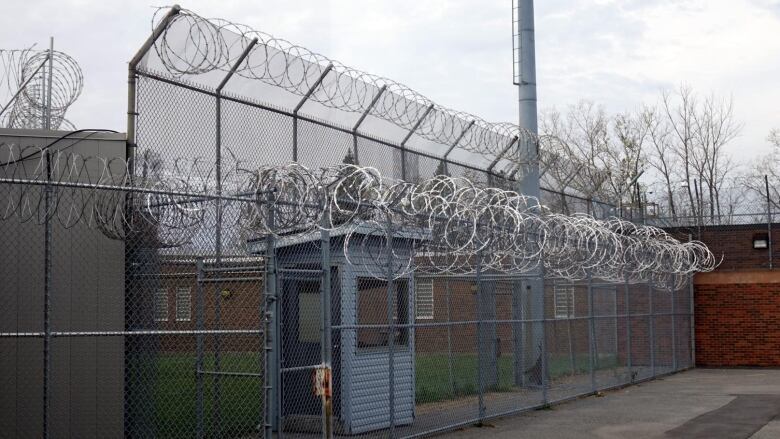 barbed wire fence at jail