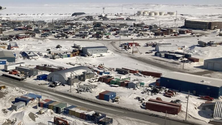 An aerial shot of an Arctic community in winter.