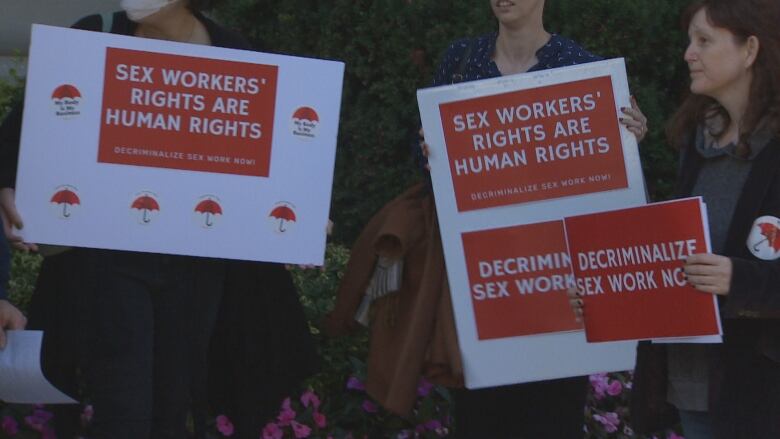 A poster of images at a hearing aimed at fully decriminalizing sex work