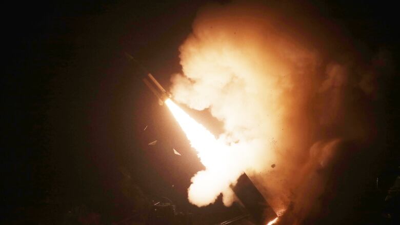 In this handout image released by the South Korean Defence Ministry, an Army Tactical Missile System (ATACMS) is fired during a joint training between the United States and South Korea, on Wednesday at an undisclosed location. The South Korean and U.S. militaries fired a volley of missiles, but one apparently failed to launch.  