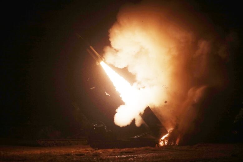 In this handout image released by the South Korean Defence Ministry, an Army Tactical Missile System (ATACMS) is fired during a joint training between the United States and South Korea, on Wednesday at an undisclosed location. The South Korean and U.S. militaries fired a volley of missiles, but one apparently failed to launch.  