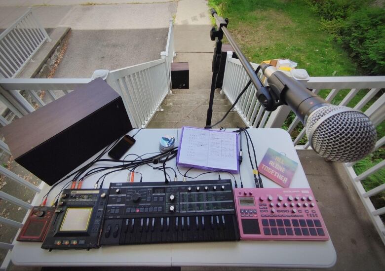 Musical equipment set up on a porch.