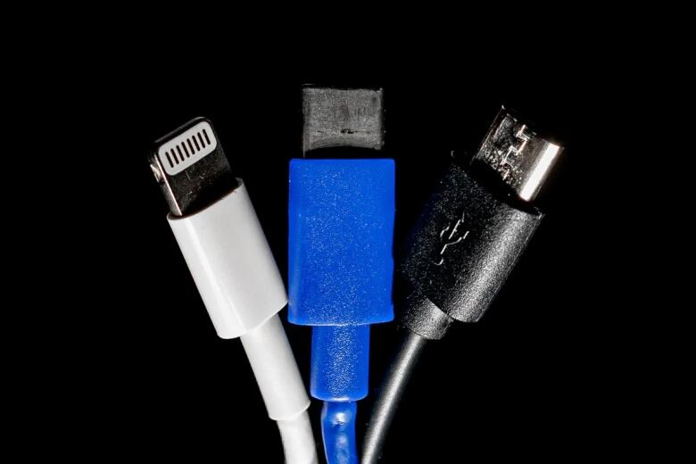 Three different smartphone chargers.