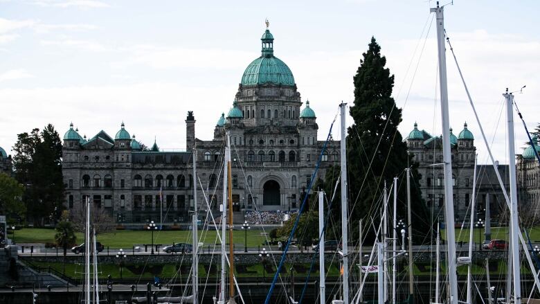  Exterior of  B.C. legislature in Victoria. A tall, imposing stone building.