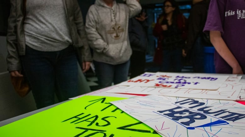 Brandonites march in the Take Back the Night walk Thursday, Oct. 20, 2022 on Princess Avenue.