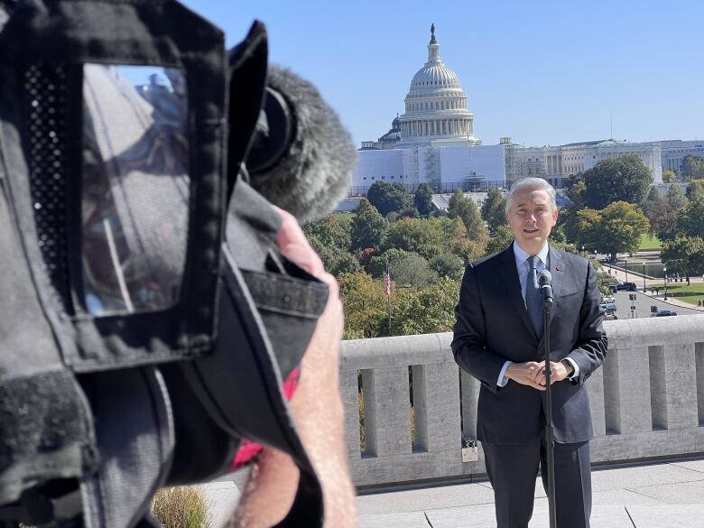 Federal minister Franois-Philippe Champagne holds a news conference on the rooftop of the Canadian embassy in Washington on Friday.  