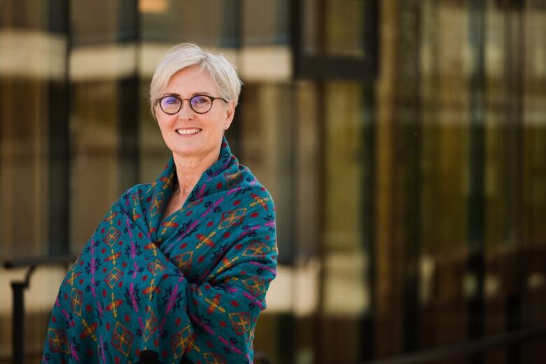 Mary Ellen Turpel-Lafond stands smiling.