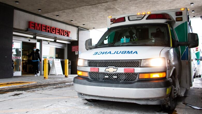 An ambulance is parked outside the Emergency Room at Foothills Medical Centre