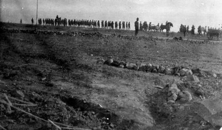 An archival image of a funeral procession.