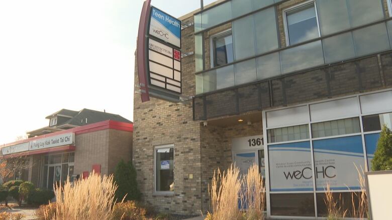 A building with a sign that reads Teen Health.