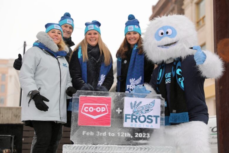 Regina Coun. Lori Bresciani, MLA Derek Myers, Federated Co-operatives Limited CEO Heather Ryan, Mayor Sandra Masters and Jack Frost pose for a photo as the 2023 edition of Frost Regina is announced on Dec. 12, 2022. 