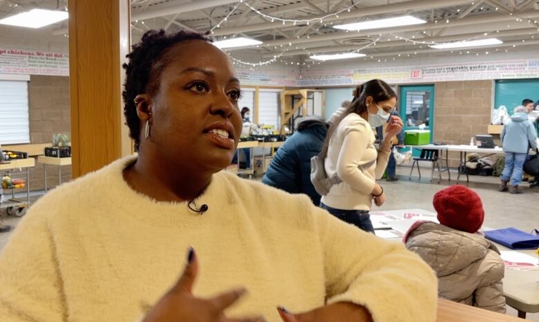 Nikiti Scringer is the director of operations for Fresh Routes. She is pictured at a Fresh Routes market at the Hillhurst Sunnyside Community Association. 