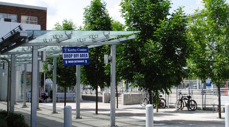 A train platform with a sign that reads 