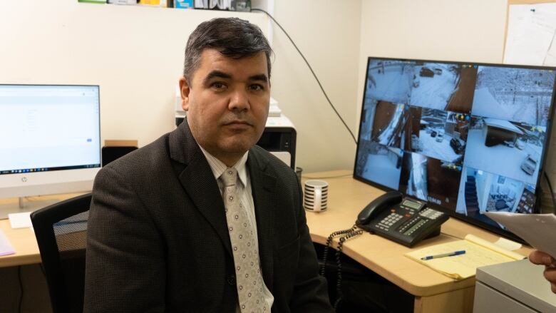 Tamim Amini works at the Afghan embassy in Ottawa. He has recently stepped in to help the consular department.