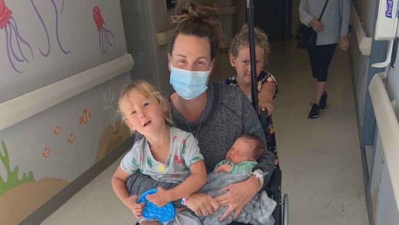 Michelle Hughes pictured with all her children in hospital. 