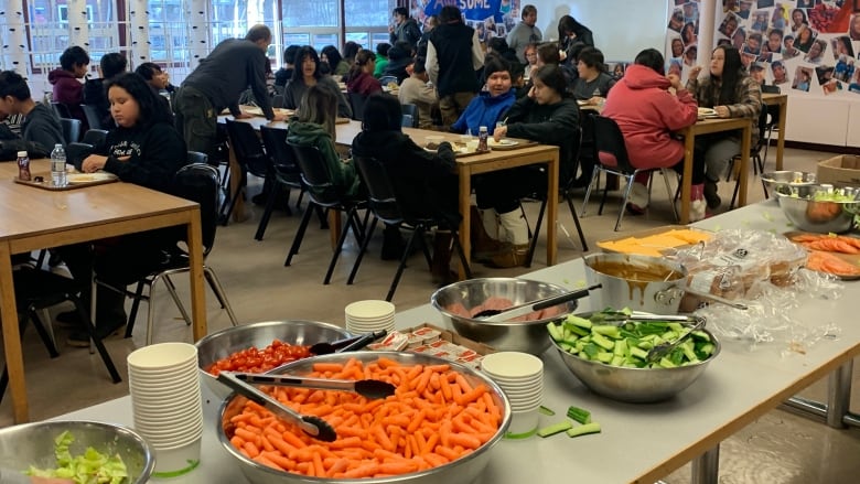 Students at Chief Jimmy Bruneau School enjoy lunch.