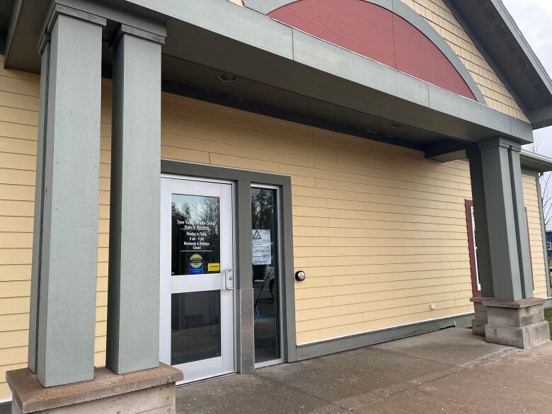 An exterior shot of the clinic building, and the main entrance. 