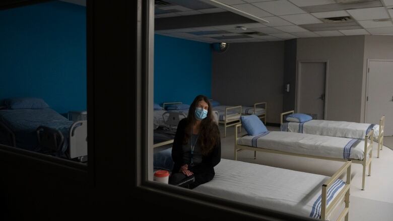 Adrienne Hughes, a manager in the social medicine department at the University Health Network (UHN), is photographed at a Stabilization & Connection Site designed to help people who are unhoused, in Toronto, Wednesday, Dec. 21, 2022.