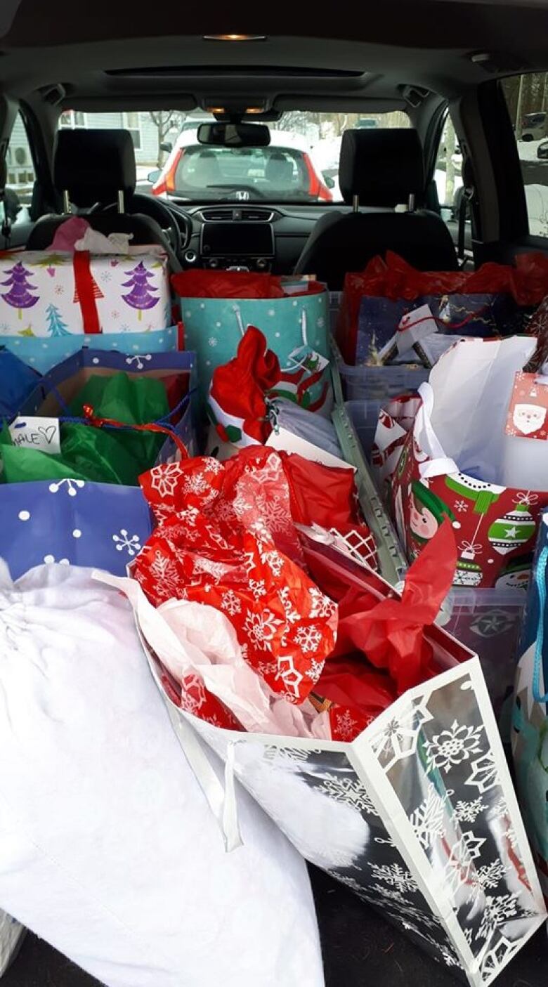 A car filled with presents