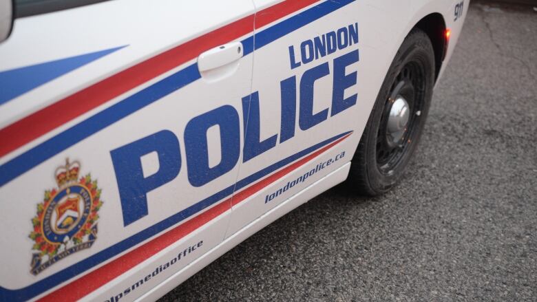 a close up of a police car that reads 