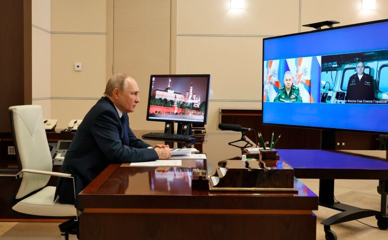 Russian President Vladimir Putin attends a videoconference. 