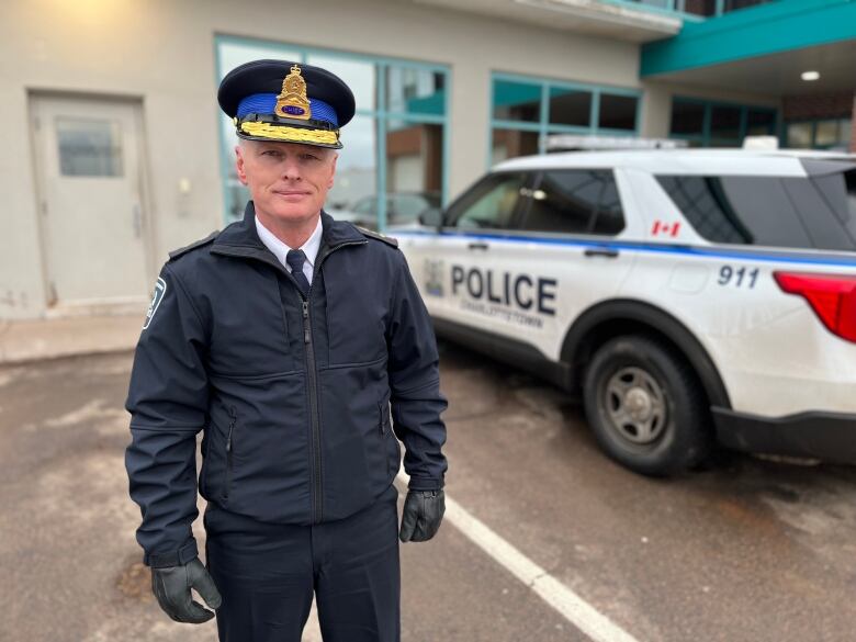 Police chief Chief Brad McConnell stands outside in the cold, facing the camera.