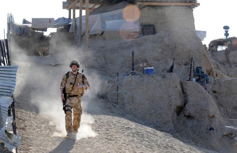 A soldier is seen on patrol.