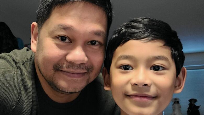 A selfie of Rommel Verdeflor, left, and his son Kyron